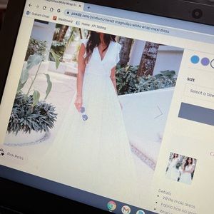 White dress perfect for a bridal shower! White wrap maxi dress.